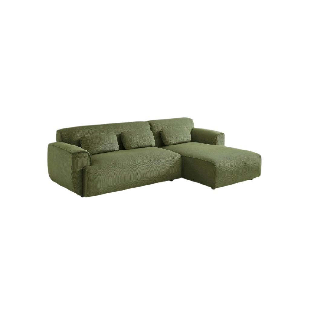 Green Fabric Sofa with Chaise Section - Suitable for Living Rooms - Made of Durable Fabric - Size Information Not Available.